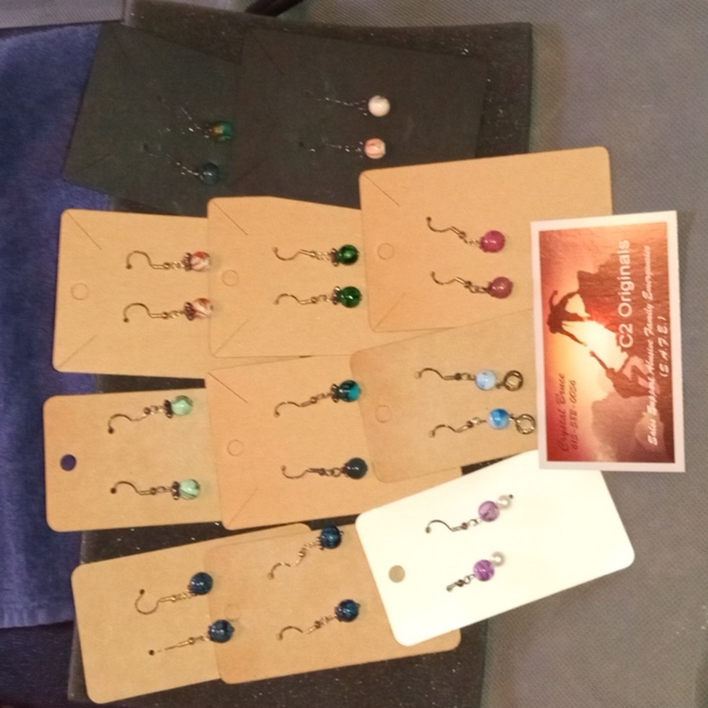 11 Pair Handmade Earrings.  Comes with cards making perfect gifts.